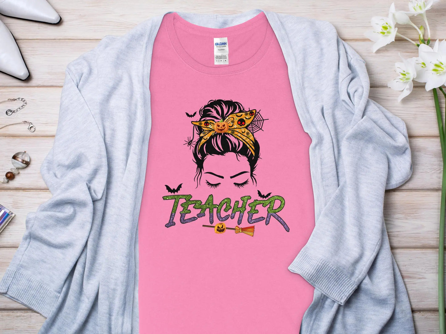 This Halloween Teacher T-Shirt is crafted from high-quality fabric in sizes to fit all shapes and size - Creations Unlimited