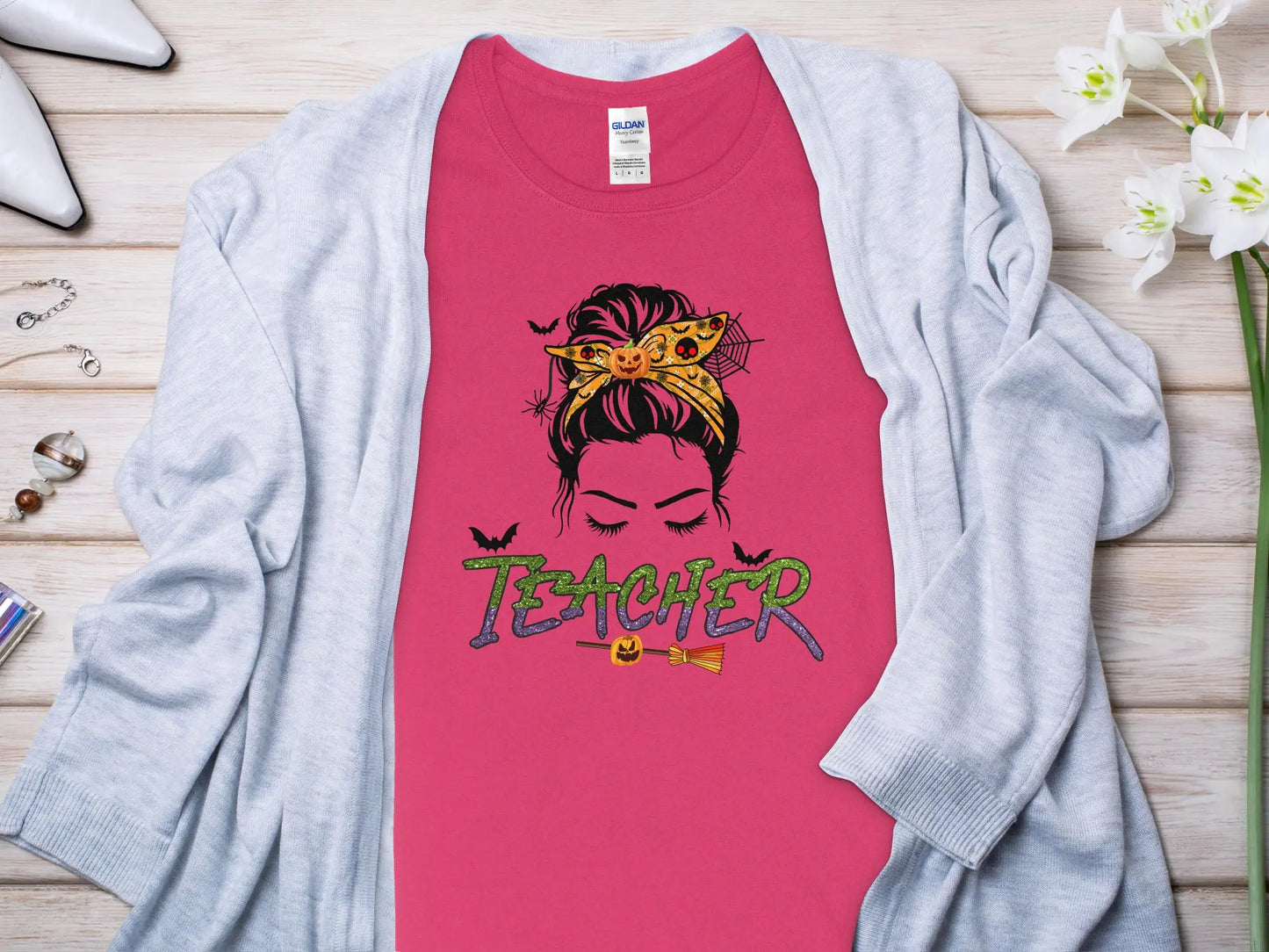 This Halloween Teacher T-Shirt is crafted from high-quality fabric in sizes to fit all shapes and size - Creations Unlimited