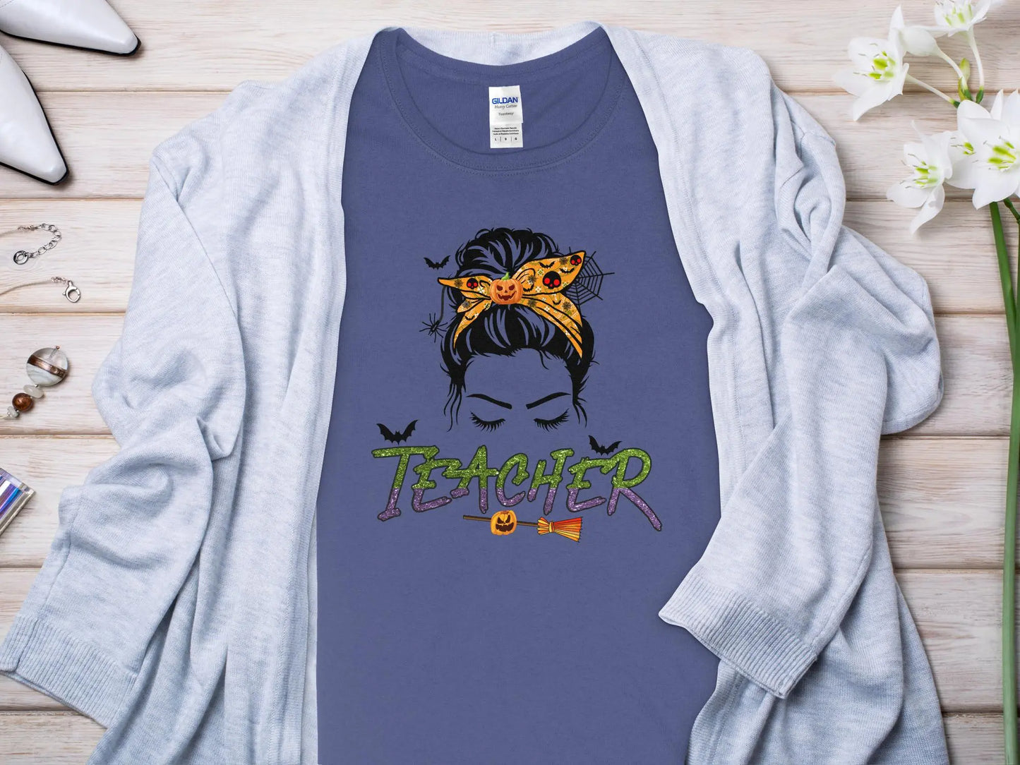 This Halloween Teacher T-Shirt is crafted from high-quality fabric in sizes to fit all shapes and size - Creations Unlimited