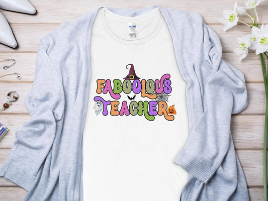 This Halloween Teacher T-Shirt is crafted from high-quality fabric in sizes to fit all shapes and size - Creations Unlimited