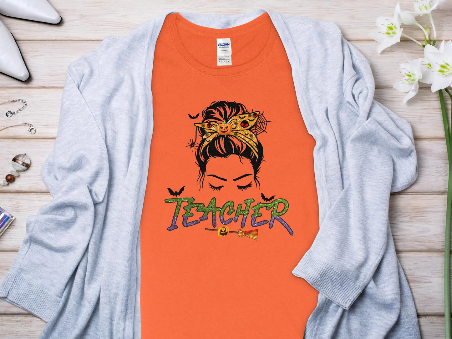This Halloween Teacher T-Shirt is crafted from high-quality fabric in sizes to fit all shapes and size - Creations Unlimited