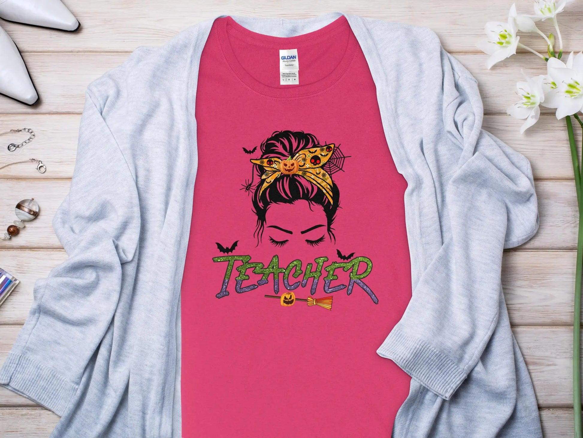 This Halloween Teacher T-Shirt is crafted from high-quality fabric in sizes to fit all shapes and size - Creations Unlimited