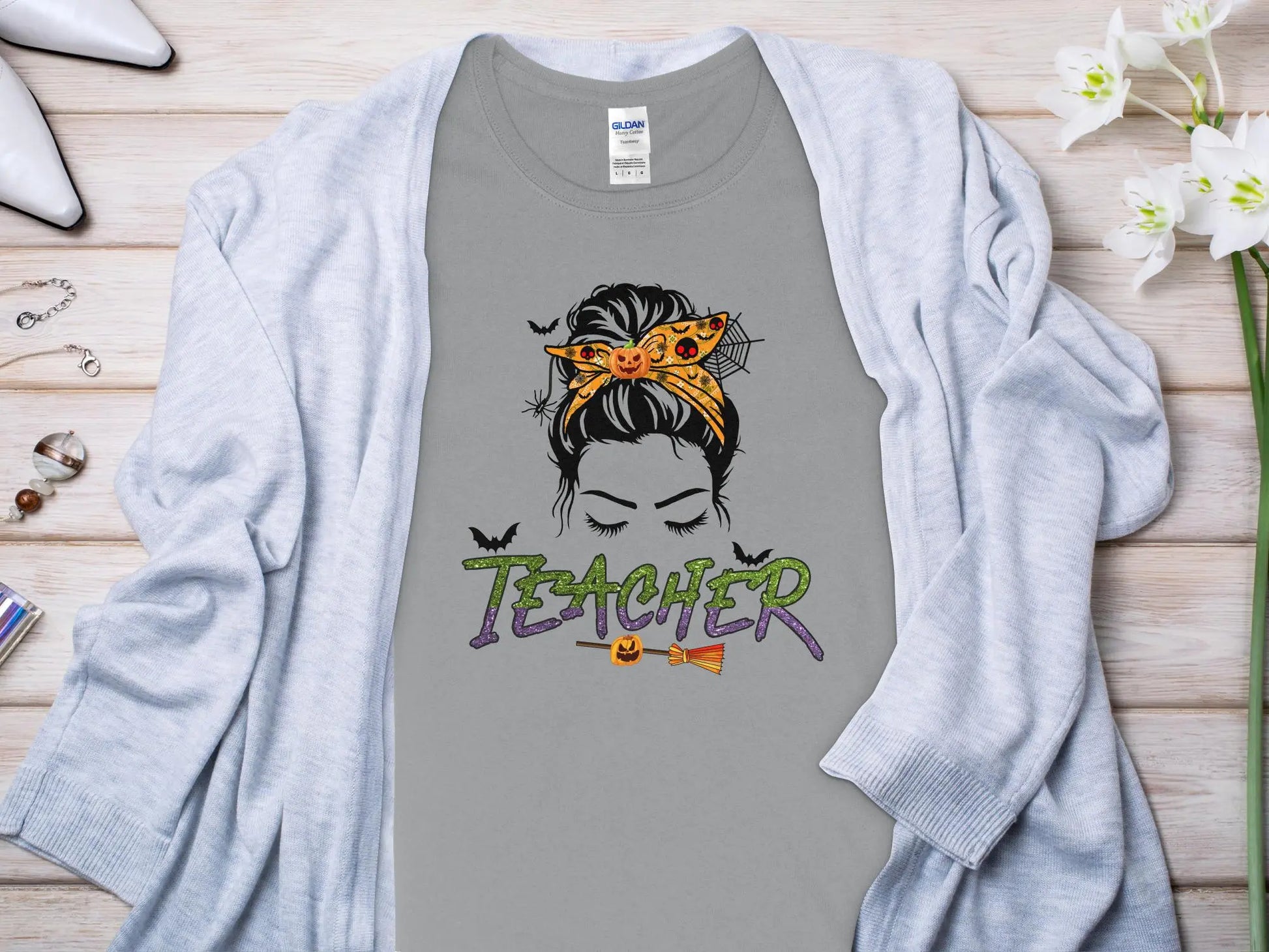 This Halloween Teacher T-Shirt is crafted from high-quality fabric in sizes to fit all shapes and size - Creations Unlimited