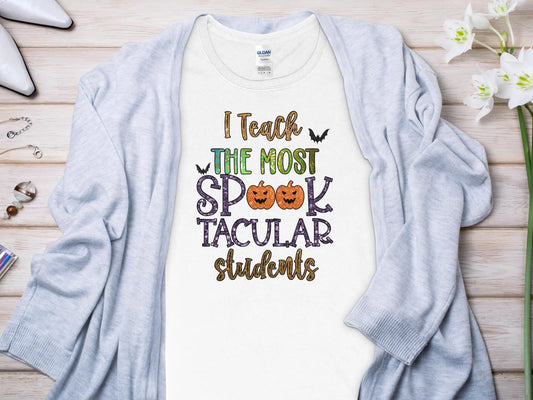 This Halloween Teacher T-Shirt is crafted from high-quality fabric in sizes to fit all shapes and size - Creations Unlimited
